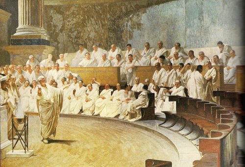 A painting capturing a group of people sitting in a room, featuring men conversing and adorned with Latin words.