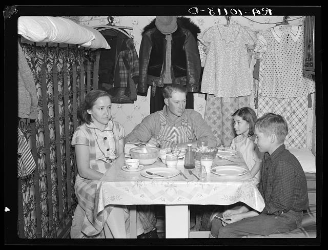During lean season, a family gathers around the table and enjoys dinner together.