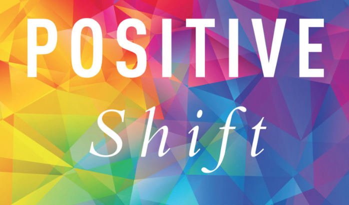 A colorful background with the words "positive shift" promoting happiness.