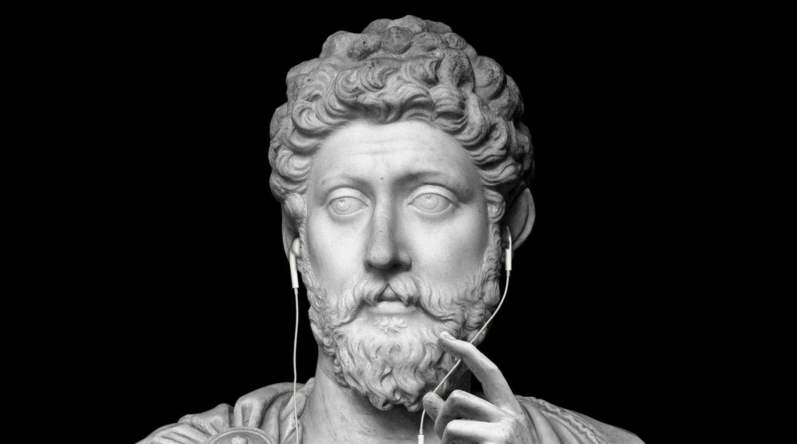 A bust of a man wearing headphones, resembling a Roman Emperor.